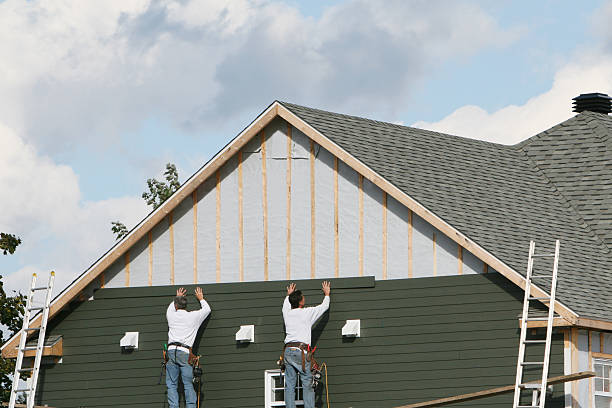 Professional Siding Repair technician working in Medfield, MA
